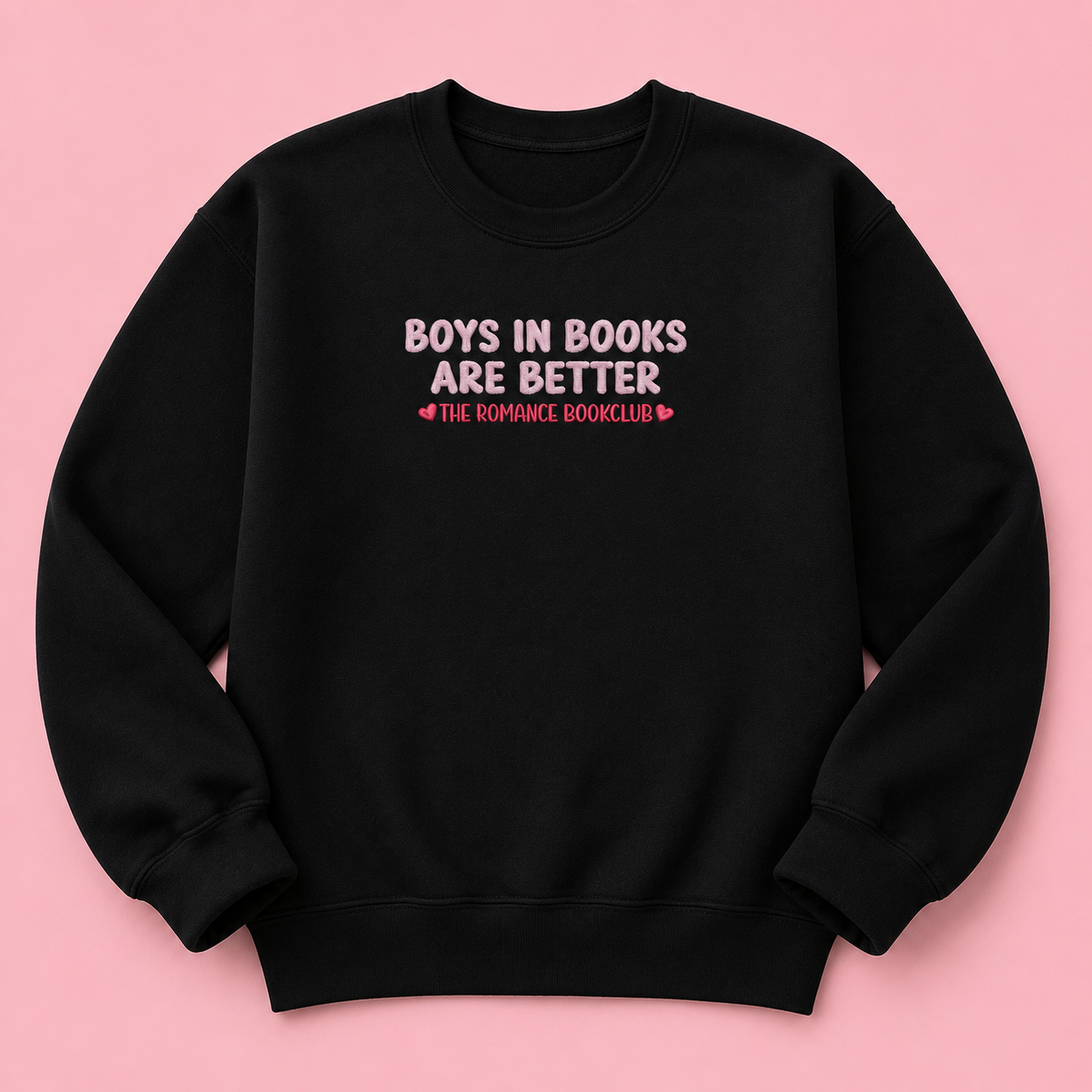 Boys in Books Are Better black jumper with pink embroidered text and heart details